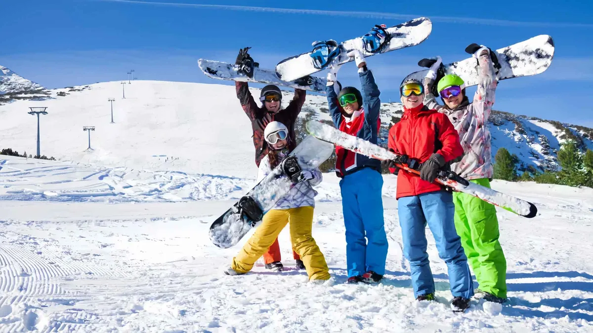 Beginner skiers on a groomed slope at Asarigawa Onsen near Otaru, the ski option among Hokkaido tours from Sapporo, Japan